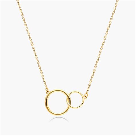 14k gold interlocking ring necklace.